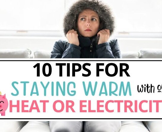 Woman sitting on a couch in a parka with text that reads 10 Tips for Staying Warm Without Heat or Electricity