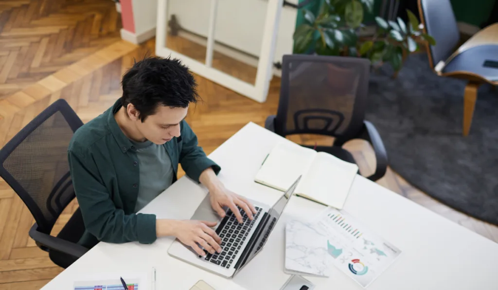 businessman using laptop at work
