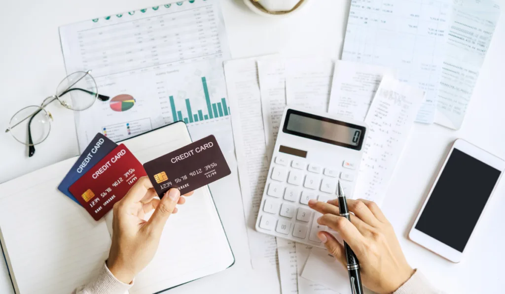 woman calculating monthly home expenses