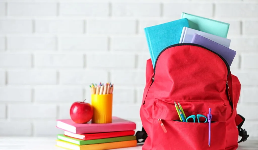 backpack with school items