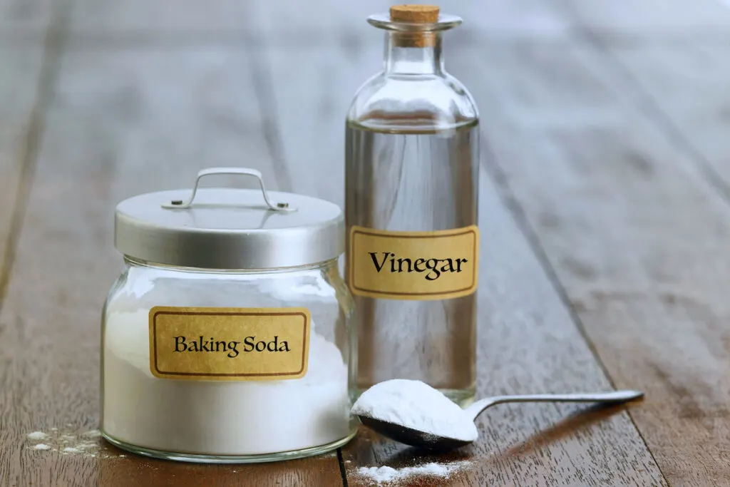 baking soda with white vinegar on the table