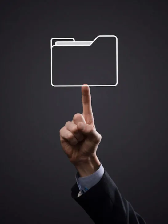 finger pointing at a computer folder - ss220915