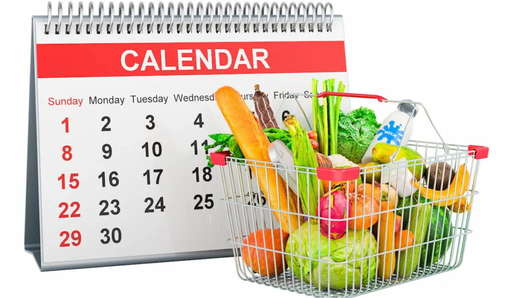 calendar meal with grocery cart with vegetables and other fruits